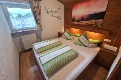 03_haus_daheim-apartment_mittagskogel_Schlafzimmer